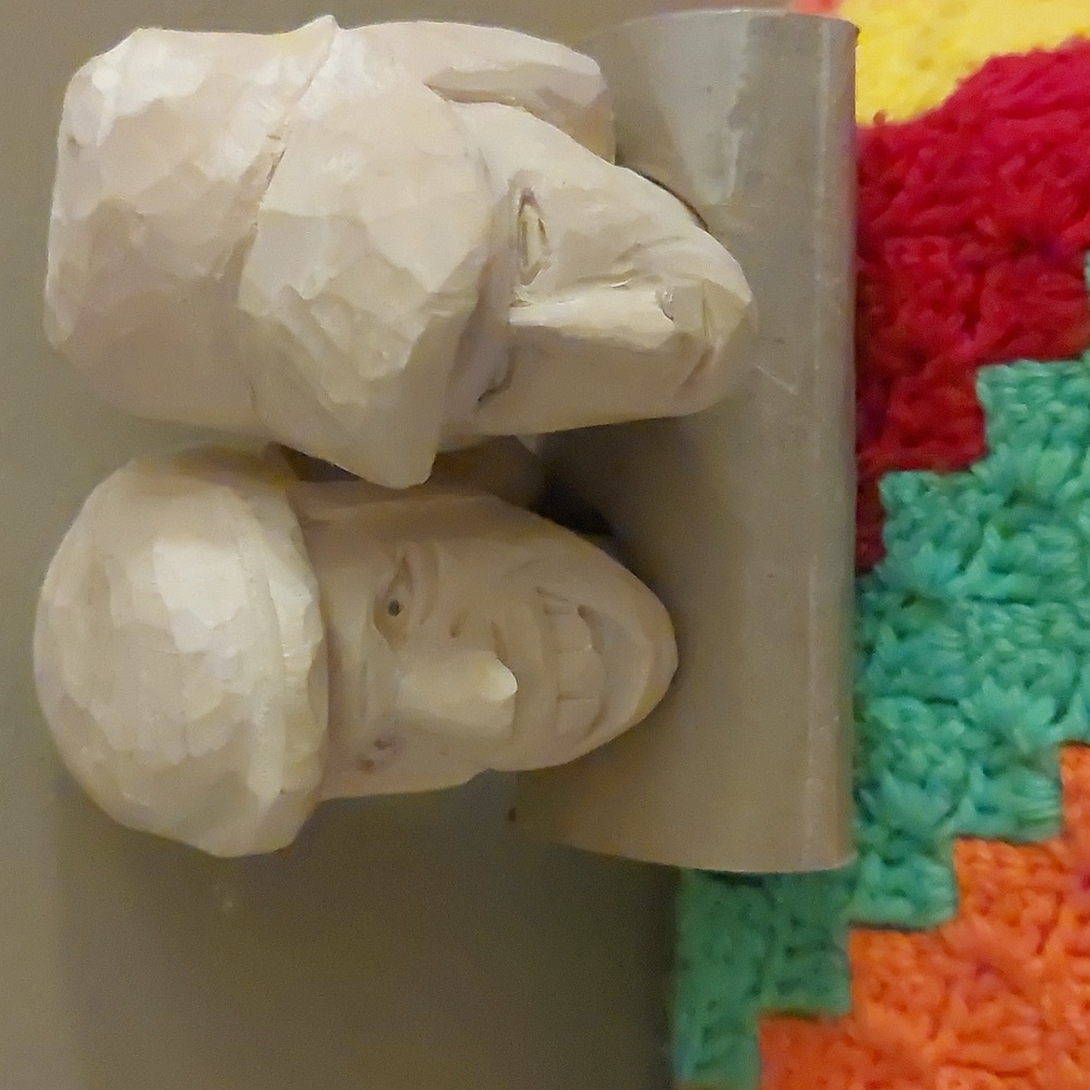 Set of 2 Hand-carved Wooden Heads